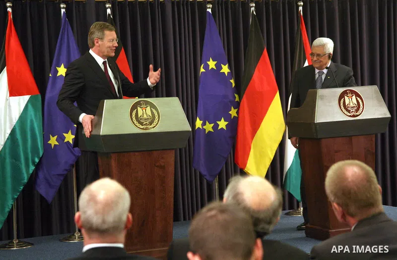 German President Christian Wulff and Palestinian President Mahmoud Abbas attend a joint press conference after their meeting in the West Bank city of Bethlehem, Nov. 30, 2010. Photo by Najeh Hashlamoun