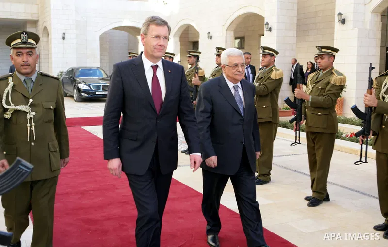 Palestinian President Mahmoud Abbas and German President Christian Wulff attend a joint press conference after their meeting in the West Bank city of Bethlehem, Nov. 30, 2010. Photo by Thaer Ganaim
