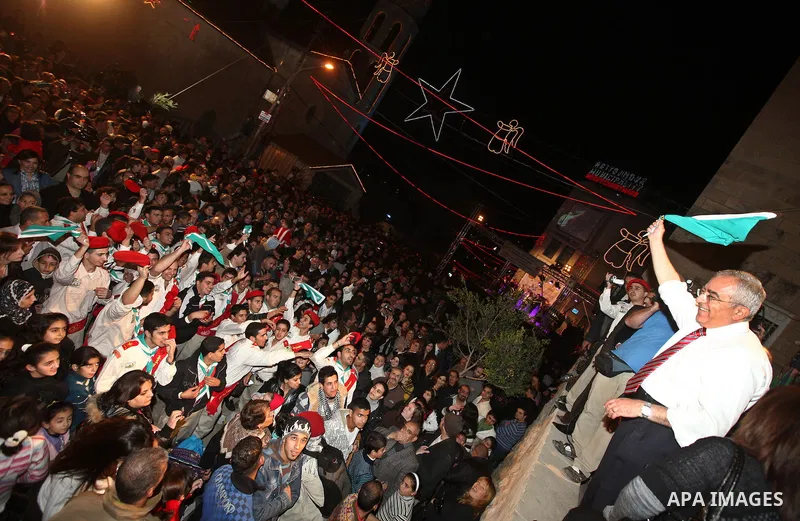 Palestinian Prime Minister, Salam Fayyad participates in the Christmas tree lighting in Beit Sahour in West Bank City of Bethlehem on Dec 19,2010. Photo by Mustafa Abu Dayeh