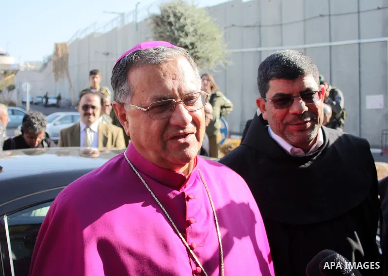 The Latin Patriarch of Jerusalem Fouad Twal arrives to the West Bank city of Bethlehem December 24, 2010. Twal crossed from Jerusalem into Bethlehem through a checkpoint on Thursday to attend an annual Christmas processi...