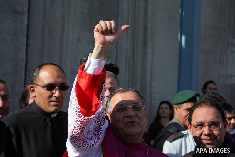 The Latin Patriarch of Jerusalem Fouad Twal arrives to the West Bank city of Bethlehem December 24, 2010. Twal crossed from Jerusalem into Bethlehem through a checkpoint on Thursday to attend an annual Christmas processi...