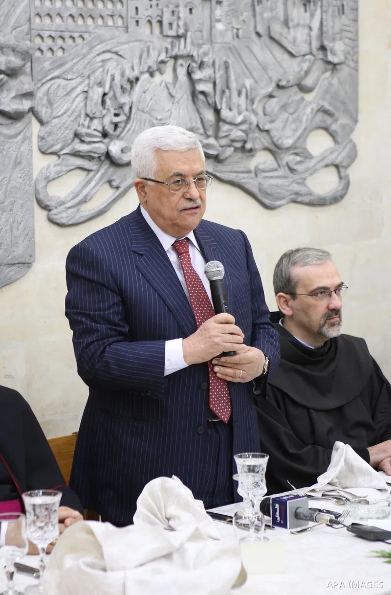 Palestinian President Mahmoud Abbas (Abu Mazen) during dinner Franciscans, in the West Bank city of Bethlehem on Dec. 24,2010. Photo by Thaer Ganaim