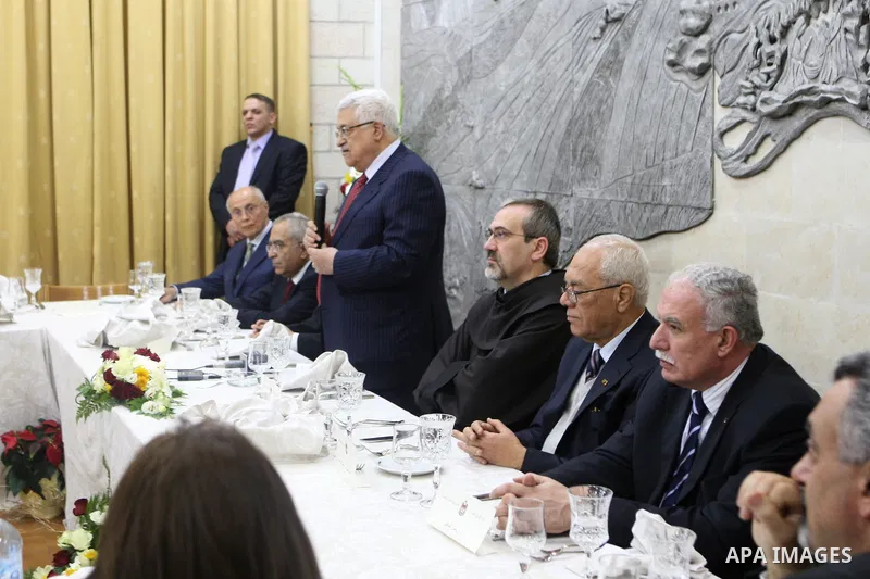 Palestinian President Mahmoud Abbas (Abu Mazen) during dinner Franciscans, in the West Bank city of Bethlehem on Dec. 24,2010. Photo by Thaer Ganaim
