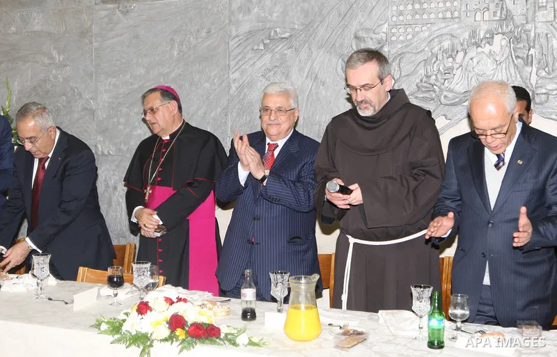 Palestinian President Mahmoud Abbas (Abu Mazen) during dinner Franciscans, in the West Bank city of Bethlehem on Dec. 24,2010. Photo by Thaer Ganaim