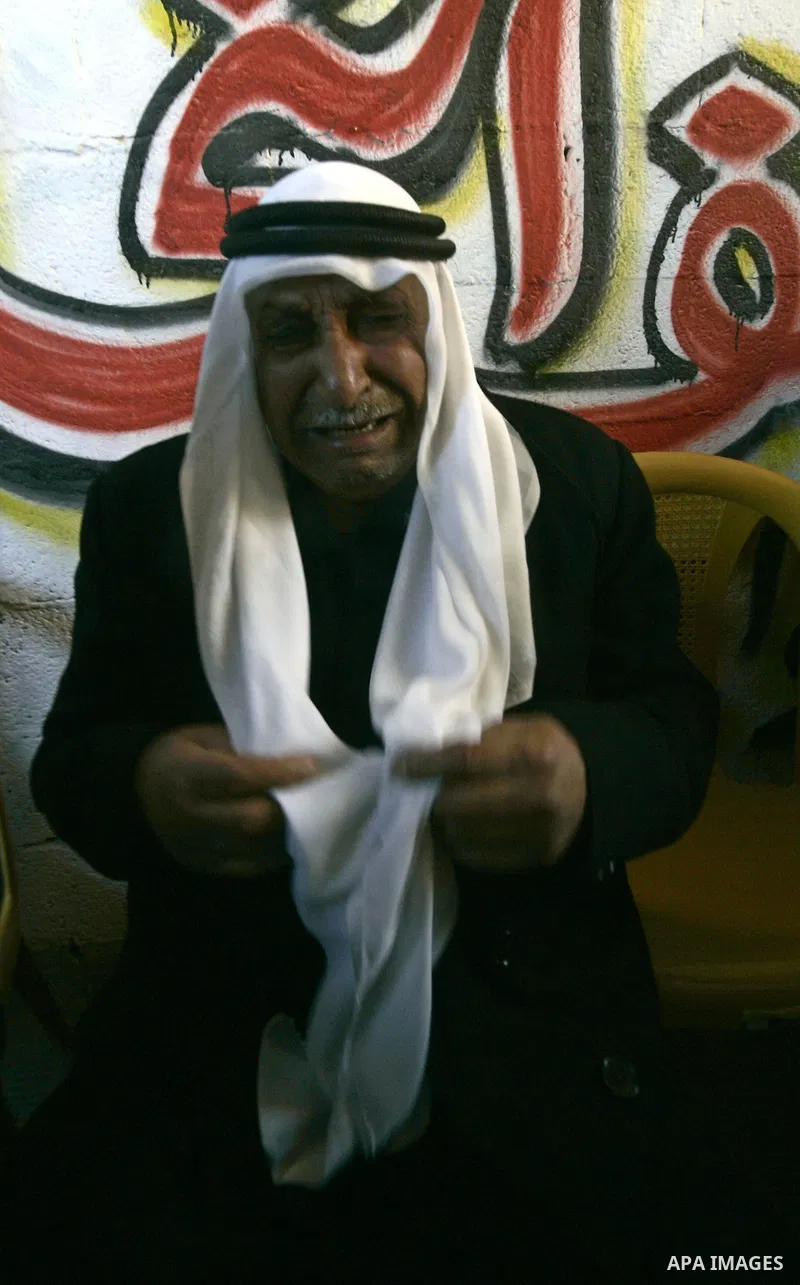 A Palestinian man mourn over the body Mahmud Alnajjar fighter of Islamic Jihad during their funeral in Khan Yunis, southern Gaza Strip on December 26, 2010. Israeli forces killed two Palestinian militants Sunday morning...