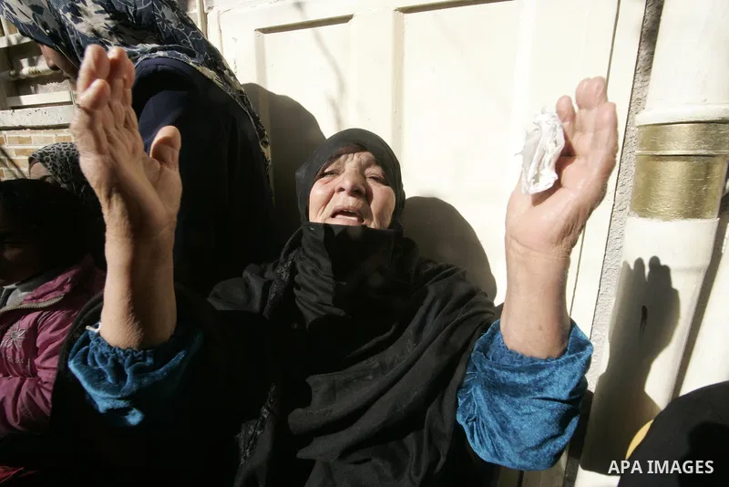 Palestinian relatives mourn over the body Mahmud Alnajjar fighter of Islamic Jihad during their funeral in Khan Yunis, southern Gaza Strip on December 26, 2010. Israeli forces killed two Palestinian militants Sunday morn...