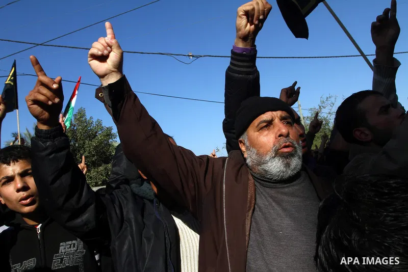 Palestinian supporters of Islamic Jihad protest during a demonstration marking the 2nd anniversary of the Israel-Gaza war, in the Jebaliya refugee camp, northern Gaza Strip, Monday, Dec. 27, 2010. Israel's volatile front...