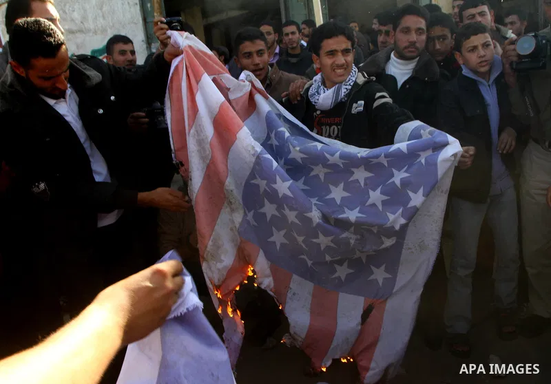 Palestinian supporters of Islamic Jihad protest during a demonstration marking the 2nd anniversary of the Israel-Gaza war, in the Jebaliya refugee camp, northern Gaza Strip, Monday, Dec. 27, 2010. Israel's volatile front...