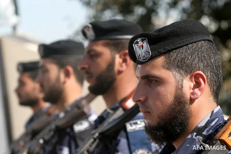 Palestinian policemen lay a wreath on the tomb of the martyrs of the policemen who were killed during the Israeli war on Gaza Strip 2008-2009, Gaza City on Dec. 27,2010. as they mark the second anniversary of the Israeli...