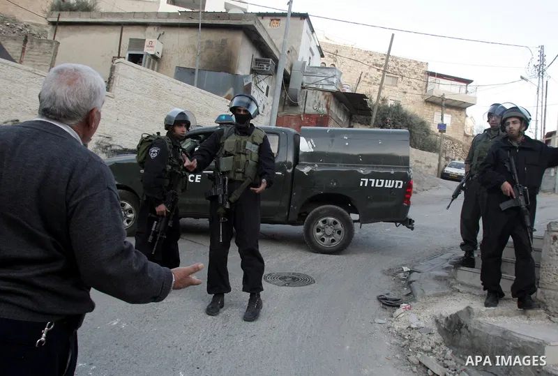 Israeli police are deployed across the flashpoint Arab east Jerusalem district of Silwan during clashes with protesters against Jewish settlement in the neighbourhood on December 27, 2010, after the city's mayor raised t...