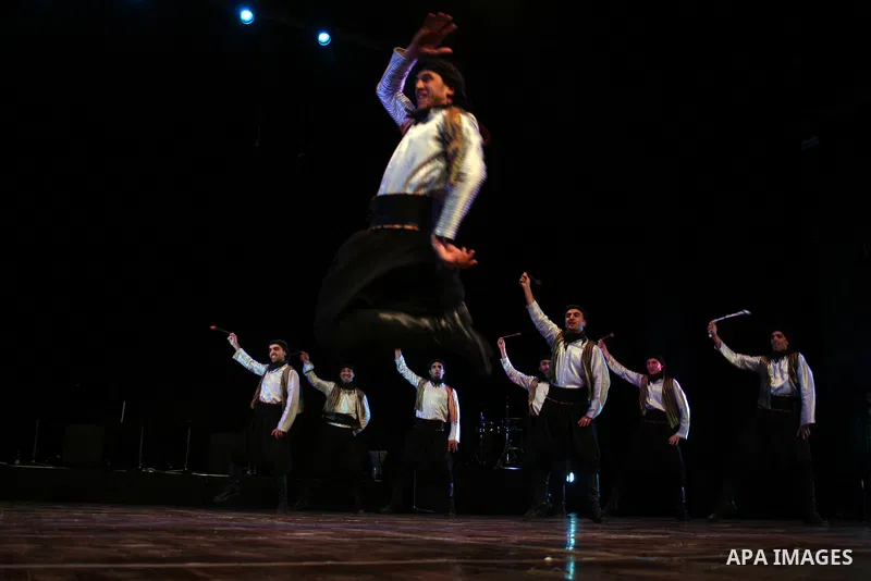 Palestinian folk dancers perform during a cultural event in the West Bank city of Ramallah, Dec. 28, 2010. Photo by Issam Rimawi