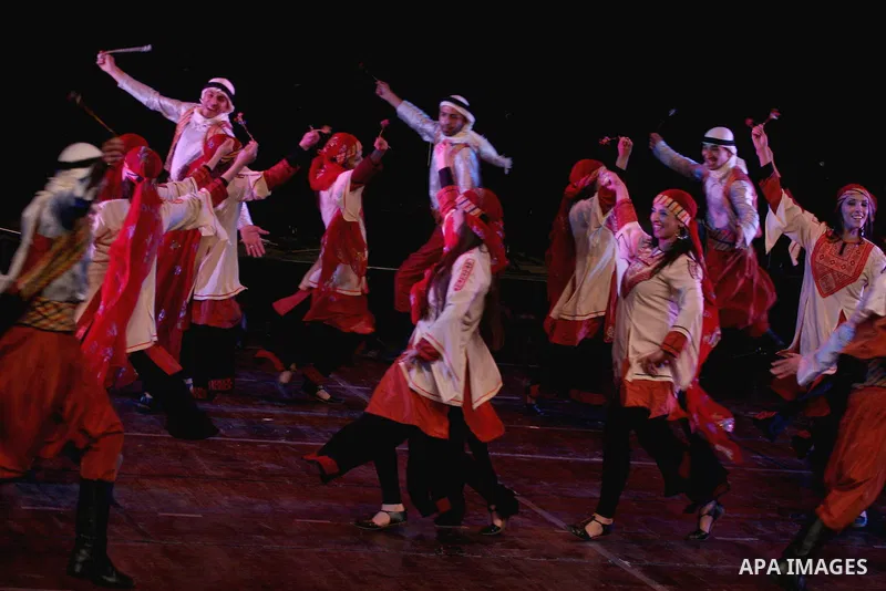 Palestinian folk dancers perform during a cultural event in the West Bank city of Ramallah, Dec. 28, 2010. Photo by Issam Rimawi