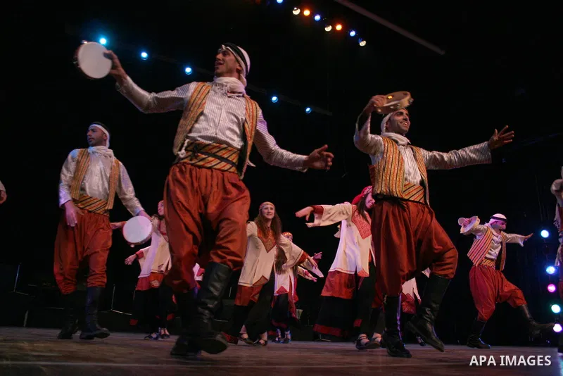 Palestinian folk dancers perform during a cultural event in the West Bank city of Ramallah, Dec. 28, 2010. Photo by Issam Rimawi