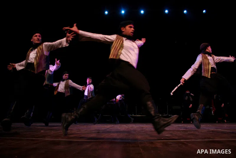 Palestinian folk dancers perform during a cultural event in the West Bank city of Ramallah, Dec. 28, 2010. Photo by Issam Rimawi
