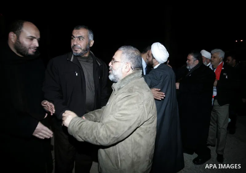 Pro-Palestinian activists recieve a cheering welcome by Palestinians upon the arrival of the "Asia 1" convoy to the Gaza Strip through Rafah border crossing between Egypt and southern Gaza Strip, Jan. 3, 2011. The Asia 1...