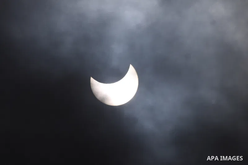 A partial solar eclipse is seen from Ramallah, in the west bank ,January 4, 2011. The partial eclipse was visible near sunrise over most of Europe and northeastern Asia on Tuesday. Photo by Issam Rimawi