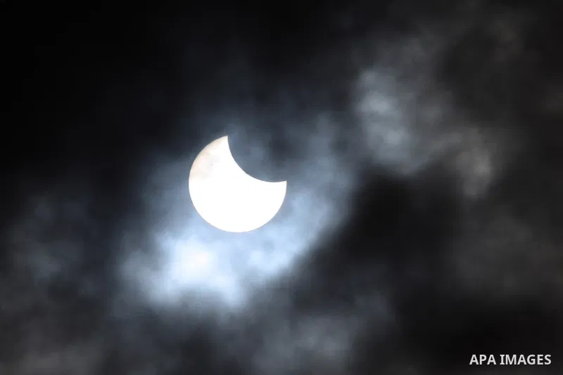 A partial solar eclipse is seen from Ramallah, in the west bank ,January 4, 2011. The partial eclipse was visible near sunrise over most of Europe and northeastern Asia on Tuesday. Photo by Issam Rimawi