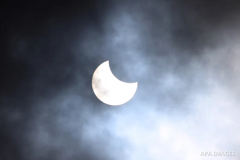 A partial solar eclipse is seen from Ramallah, in the west bank ,January 4, 2011. The partial eclipse was visible near sunrise over most of Europe and northeastern Asia on Tuesday. Photo by Issam Rimawi