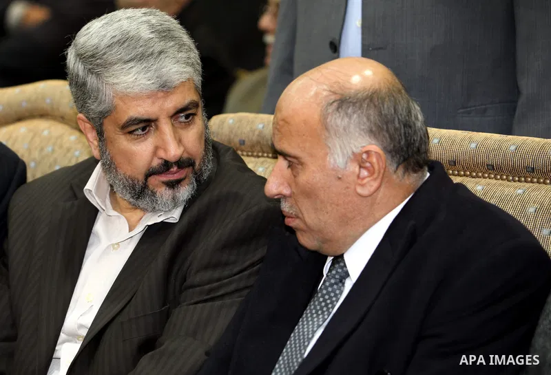 The head of the Hamas political bureau, Khaled Mashaal offers his condolence on the death of the elder brother of the Palestinian President Mahmoud Abbas in Damascus on Jan. 4,2011. Photo by STR