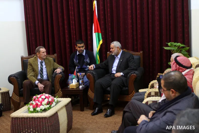 Palestinian Prime Minister in Gaza Strip, Ismail Haneya meets with former US Attorney General Ramsey Clark at Haneya's governmental headquarters in Gaza City on Jan. 5, 2011. An unofficial American delegation headed by f...