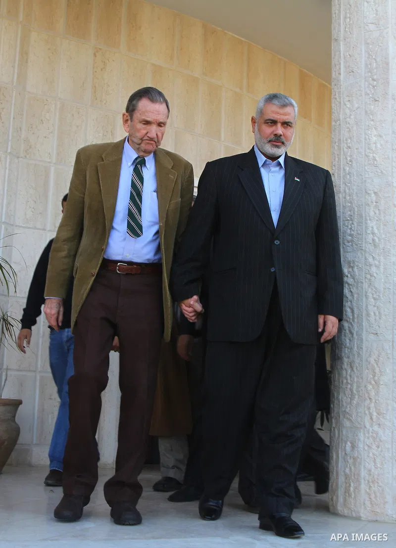 Palestinian Prime Minister in Gaza Strip, Ismail Haneya and former US Attorney General Ramsey Clark attend a press conference in Gaza City on Jan. 5, 2011. An unofficial American delegation headed by former US Attorney G...