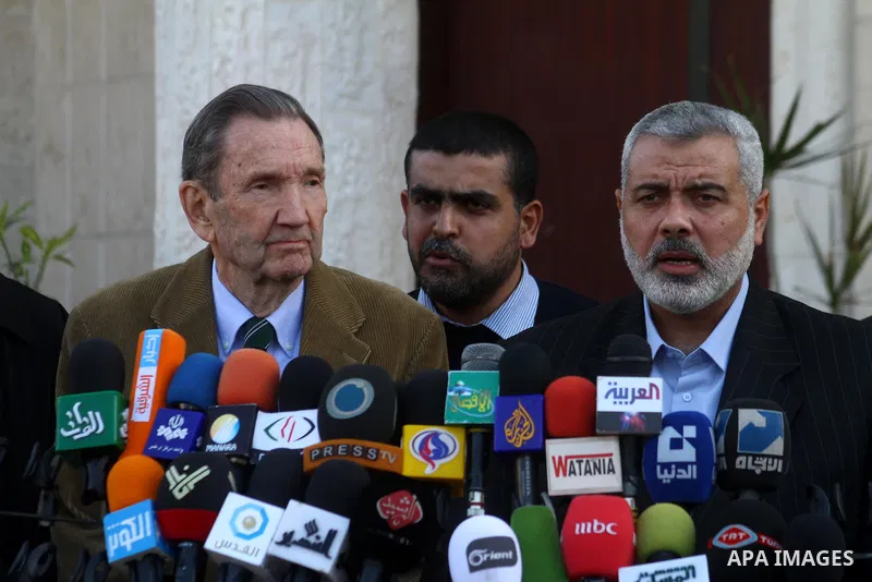 Palestinian Prime Minister in Gaza Strip, Ismail Haneya and former US Attorney General Ramsey Clark attend a press conference in Gaza City on Jan. 5, 2011. An unofficial American delegation headed by former US Attorney G...