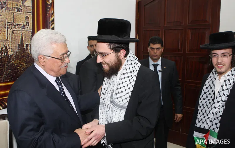 Palestinian President Mahmoud Abbas during the reception of his people, the clergy, Christians, Muslims, Druze, consuls, head of the Islamic movement, Sheikh Raed Salah, legislator from Hamas, and the peace delegation of...