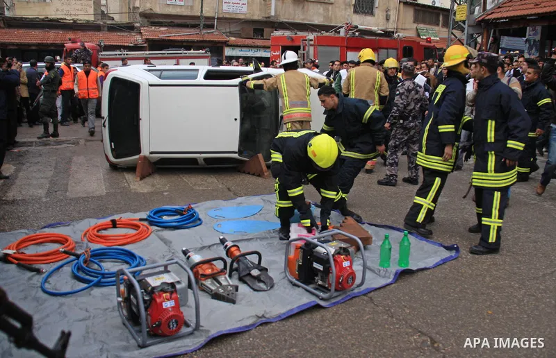 Members of Palestinian National Security Forces, Civil Defense and Red Crescent take part in a training an emergency evacuation , in the West Bank city of Qalqilya, Thursday, Jan. 6, 2011. Photo by Wagdi Eshtayah