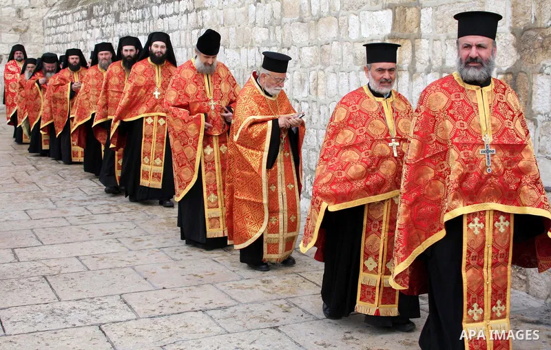 Greek Orthodox Patriarch of Jerusalem Theofilos III waves a censer as he stand in the Nativity church during the Greek Orthodox Christmas Eve in the West Bank city of Bethlehem, Thursday, Jan. 6, 2011. Christmas falls on...