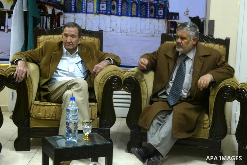 Palestinian Prime Minister adviser, Ahmed Yousef meets with former US attorney general Ramsey Clark at Rafah crossing border between Egypt and Gaza while Clark leaves the Gaza Strip After his visit to the enclave strip o...