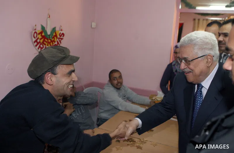 Palestinian President Mahmoud Abbas during a visit to Basma Centre for rehabilitation of disabled persons, in Beit Sahour town east of Bethlehem on Jan. 7, 2011. Photo by Thaer Ganaim