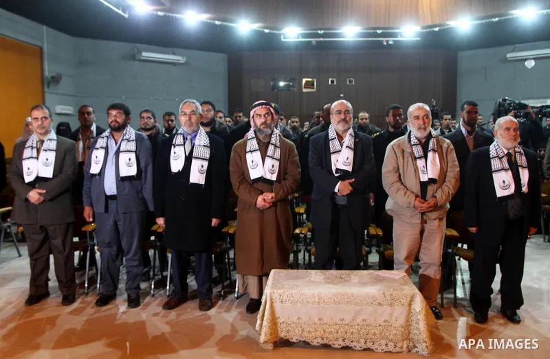 Palestinian leaders attend a celebration to honor Palestinian disabled who injured during the Israeli war on Gaza Strip 2008-2009 on the second anniversary of the war, in Gaza city on Jan. 8,2011. Photo by Ashraf Amra