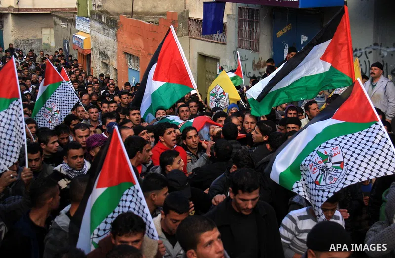 Palestinians carry the body of Khaldon Samodi ,25, during his funeral at al Yamoun Village near The West Bank City of Jenin on 08 January 2011. Israeli soldiers allegedly shot and killed Samodi at Hamra checkpoint east o...