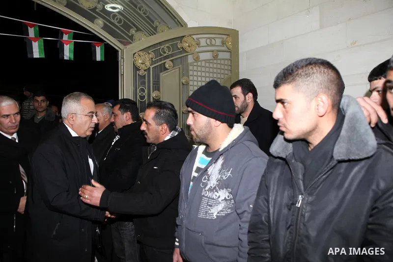 Palestinian Prime Minister, Salam Fayyad condolences to the family of the martyr Omar Salim Qawasmi in the West Bank city of Hebron on Jan. 9,2011. Photo by Mustafa Abu Dayeh