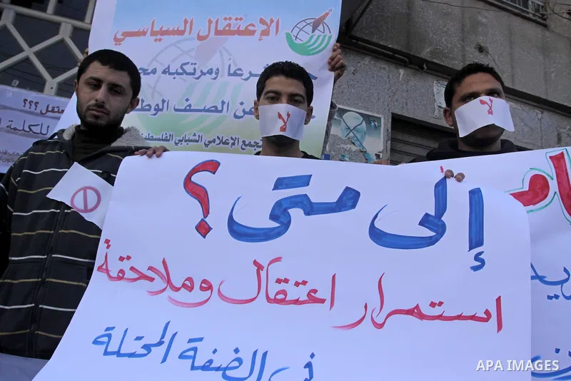 Palestinian journalists attend a protest against arrests of the journalists by the security forces in the West Bank, Gaza City on Jan. 11, 2011. Photo by Mohammed Asad