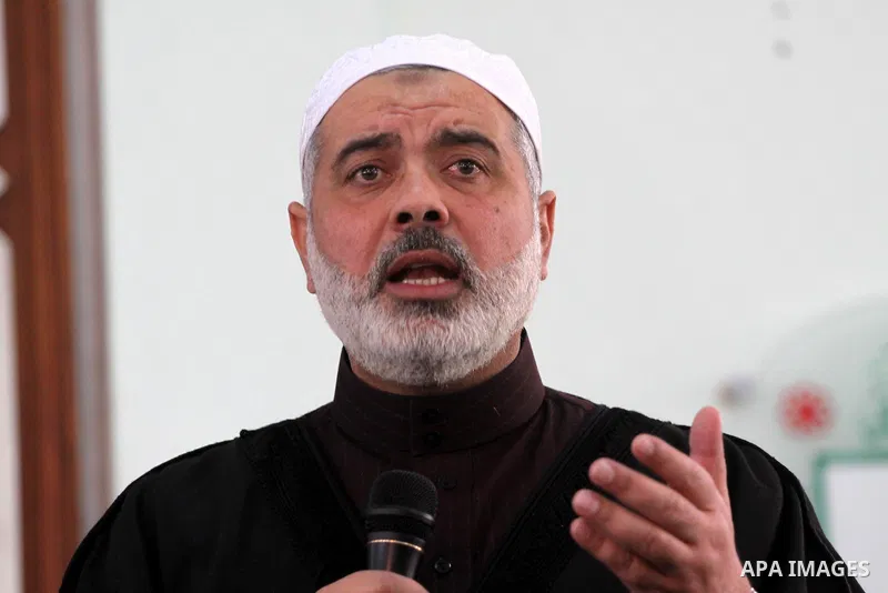 Palestinian Prime Minister in Gaza Strip, Ismail Haniyeh attends a celebration to launch a book for the martyr Said Siyam in Gaza city on Jan. 14,2011. Photo by Mohammed Asad