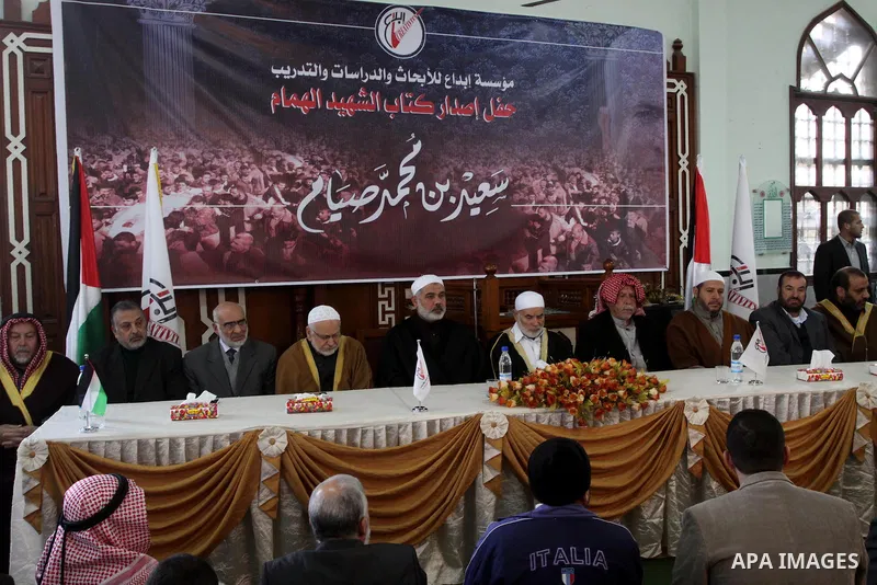 Palestinian Prime Minister in Gaza Strip, Ismail Haniyeh attends a celebration to launch a book for the martyr Said Siyam in Gaza city on Jan. 14,2011. Photo by Mohammed Asad