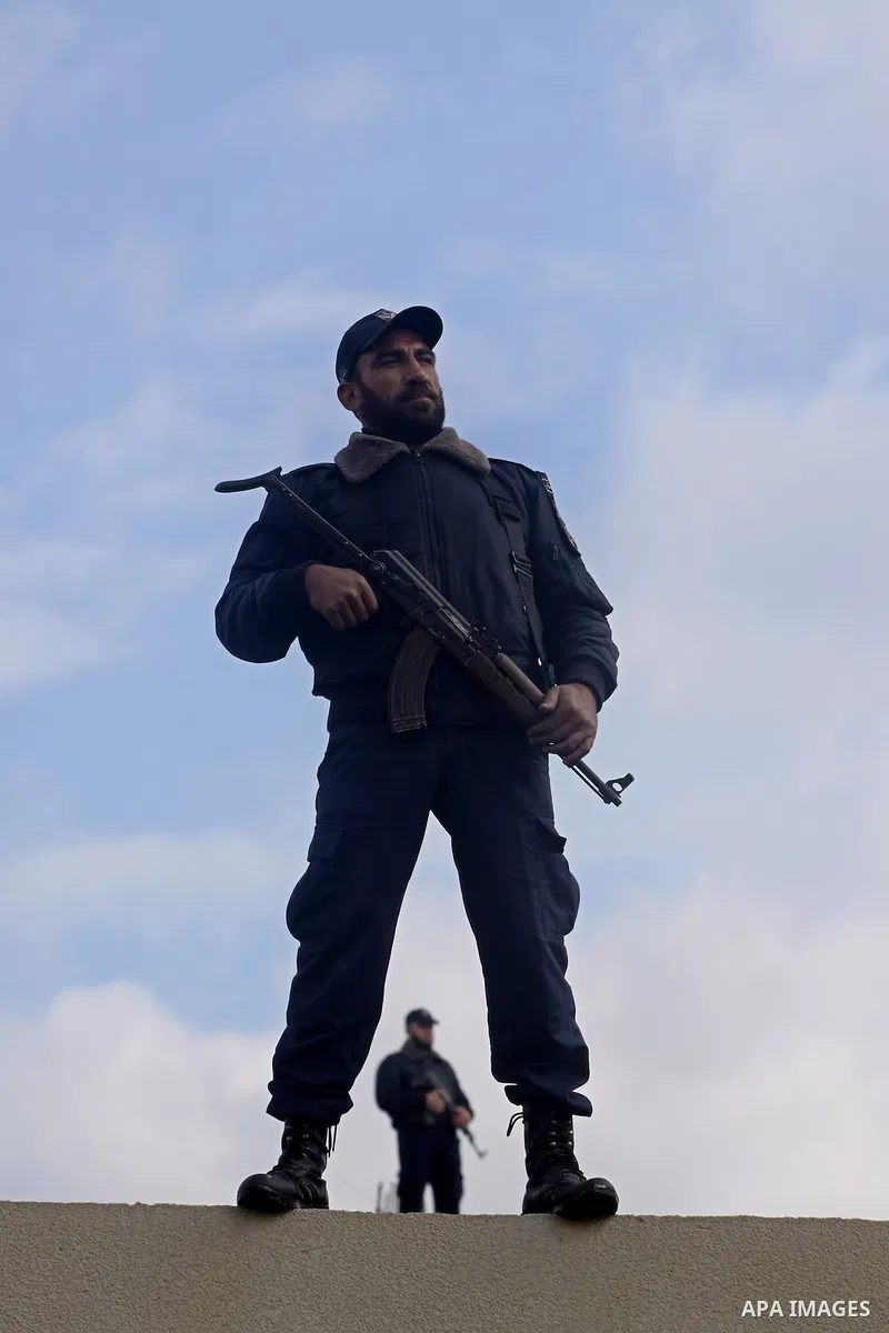 Palestinian policemen in Gaza Strip, take part in opening ceremony of a new police station, in Gaza City on Jan. 15,2011. Photo by Mohammed Asad