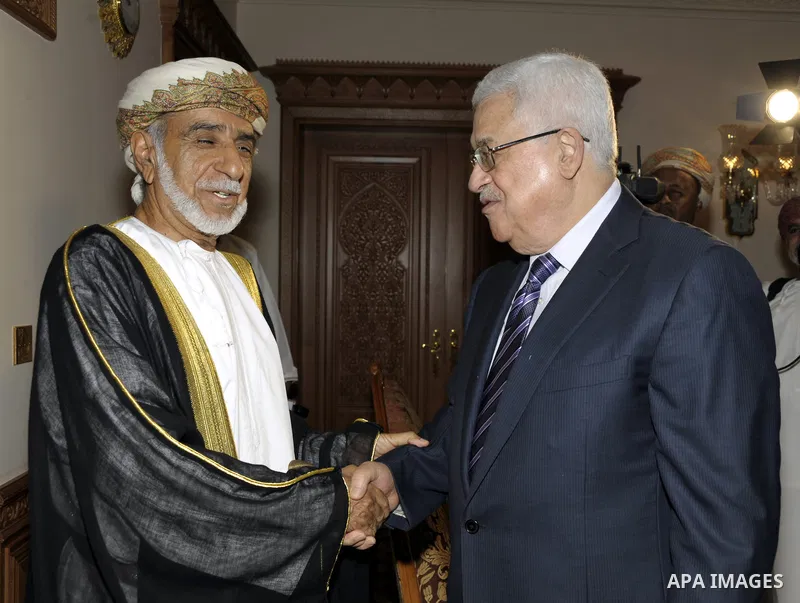 Palestinian President Mahmoud Abbas (Abu Mazen) meets with the head of the Omani Shura Council, Ahmed bin Mohammed Al-Issa in the Omani capital of Muscat, Jan. 15,2011. Photo by Omar Rashidi