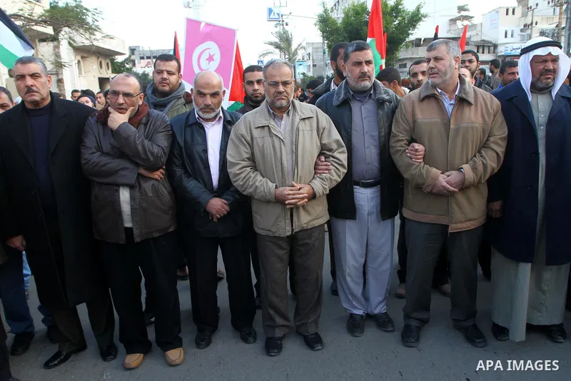 Palestinian Jihad Islamic supporters take part in a protest in solidarity with the Tunisian people in Gaza city on January 15, 2011. The protest confirmed that the two peoples, Palestinian and Tunisian linked by strong t...
