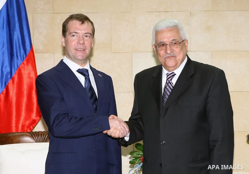 Palestinian President Mahmoud Abbas (R) during a reception of Russian President Dmitry Medvedev (L) to an state visit in the West Bank town of Jericho, on 18 January 2011. Medvedev is making a rare visit to the West Bank...