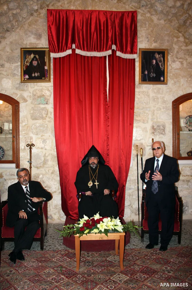Armenian Orthodox Archbishop Nourhan Manougian arrives to the the Church of the Nativity, which houses the biblical birth place of Jesus Christ, in the West Bank town of Bethlehem on January 18, 2011, to celebrate Christ...