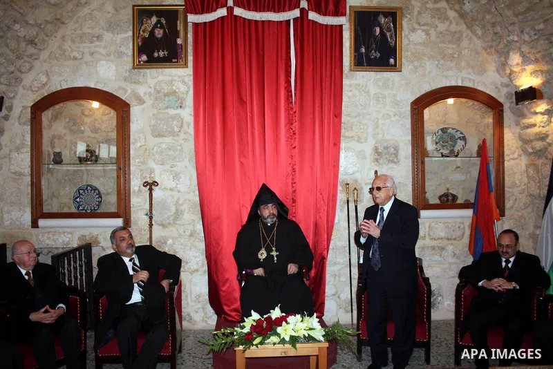 Armenian Orthodox Archbishop Nourhan Manougian arrives to the the Church of the Nativity, which houses the biblical birth place of Jesus Christ, in the West Bank town of Bethlehem on January 18, 2011, to celebrate Christ...