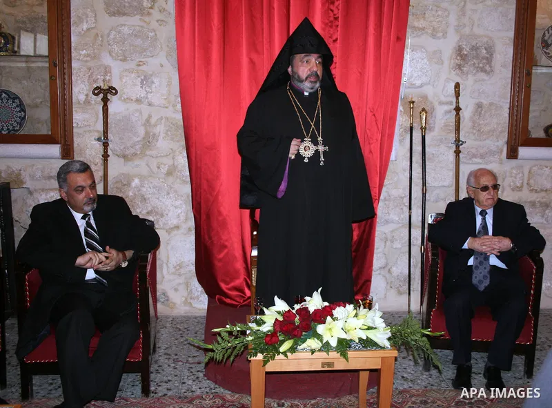 Armenian Orthodox Archbishop Nourhan Manougian arrives to the the Church of the Nativity, which houses the biblical birth place of Jesus Christ, in the West Bank town of Bethlehem on January 18, 2011, to celebrate Christ...