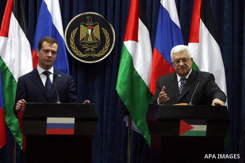 Palestinian President Mahmoud Abbas and Russian President Dmitry Medvedev hold a press conference in the West Bank town of Jericho, Tuesday, Jan. 18, 2011. Medvedev arrived in the West Bank on Tuesday for a visit seized...