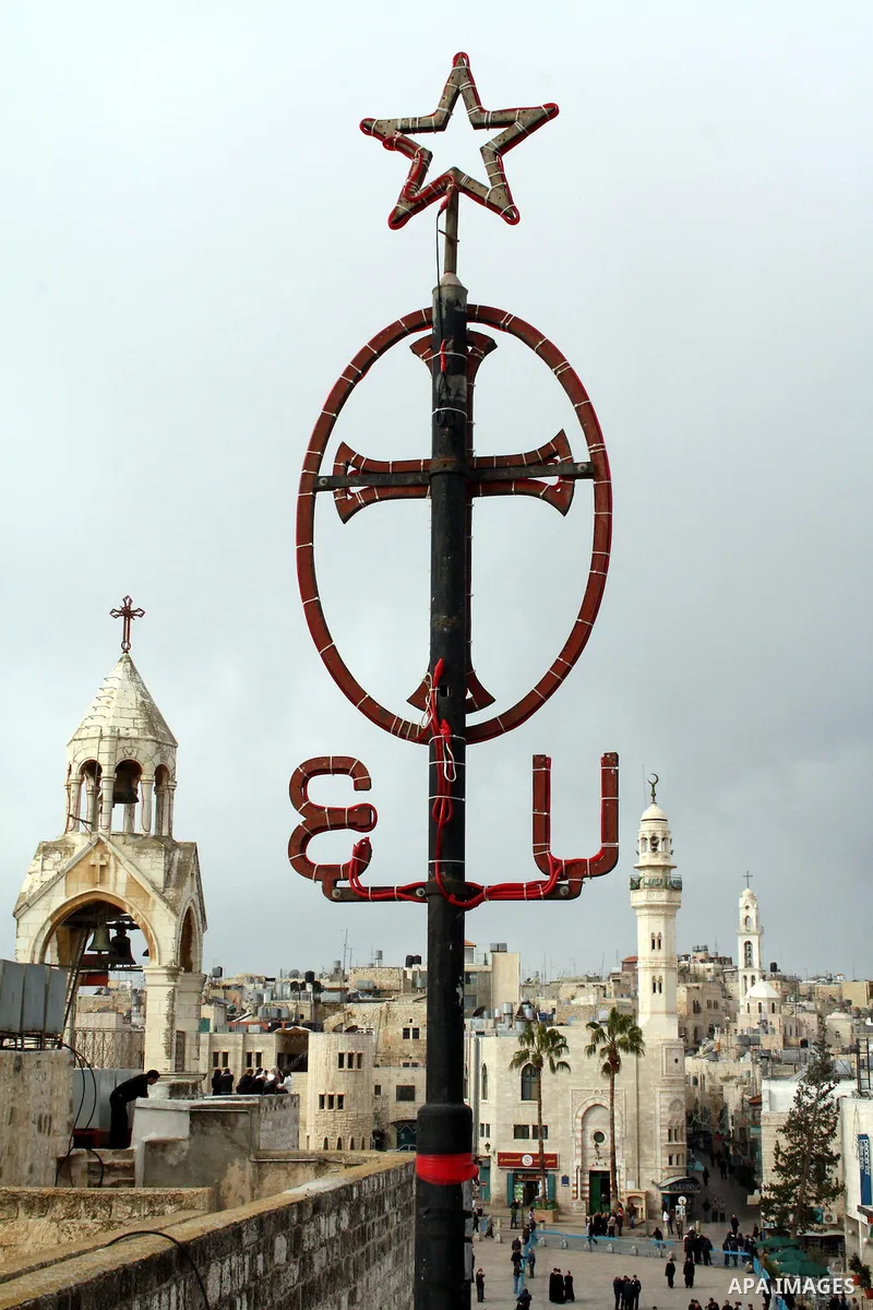 The Church of the Nativity and the 19th century mosque of Omar ibn al-Khattab looks over Manger Square on January 18, 2011 in Bethlehem, West Bank. The city square, which on Christmas Eve is filled with pilgrims and loca...