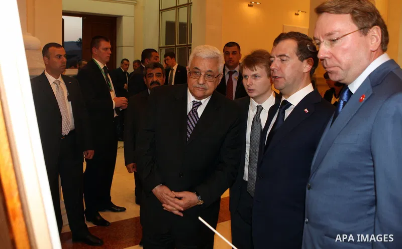 Palestinian Authority President Mahmud Abbas (C) and Russian President Dmitry Medvedev (C-R) during a visit to the Jericho Museum in the West Bank Oasis town of Jericho on 18 January 2011. Photo by Thaer Ganaim