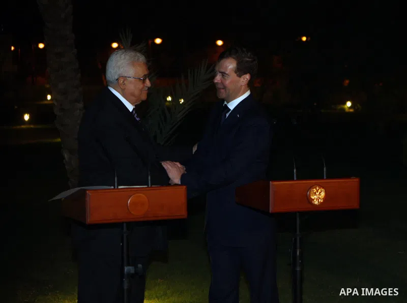 Palestinian Authority President Mahmud Abbas (L) shakes hands with Russian President Dmitry Medvedev (R) during a visit to the Jericho Museum in the West Bank Oasis town of Jericho on 18 January 2011. Photo by Thaer Gana...