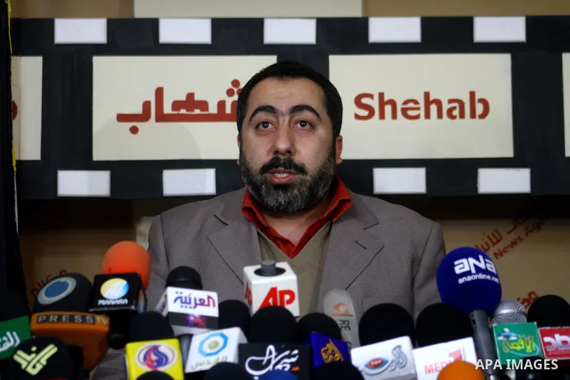 The spokesman of the Palestinian Government in Gaza Strip, Taher al-Nono delivers speech during a press conference in Gaza city on Jan. 23,2010 calling Egypt to provide evidence about the Palestinian armed group in Gaza...