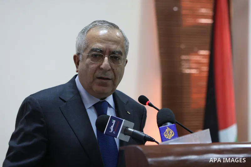 Palestinian Prime Minister, Salam Fayyad attends the opening ceremony of the annual conference held by Mass institution in the West Bank city of Ramallah on Jan. 23,2011. Photo by Mustafa Abu Dayeh
